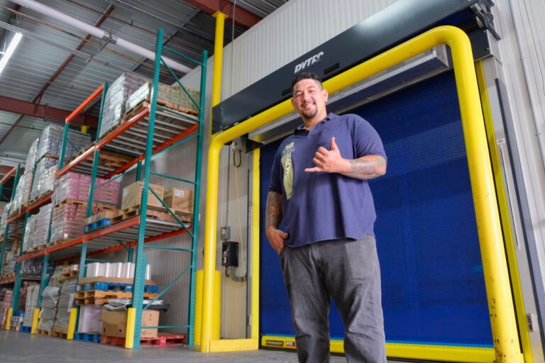 Dennis posing in warehouse