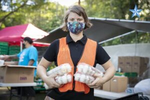 Woman with eggs, photo courtesy Honolulu Star Advertiser