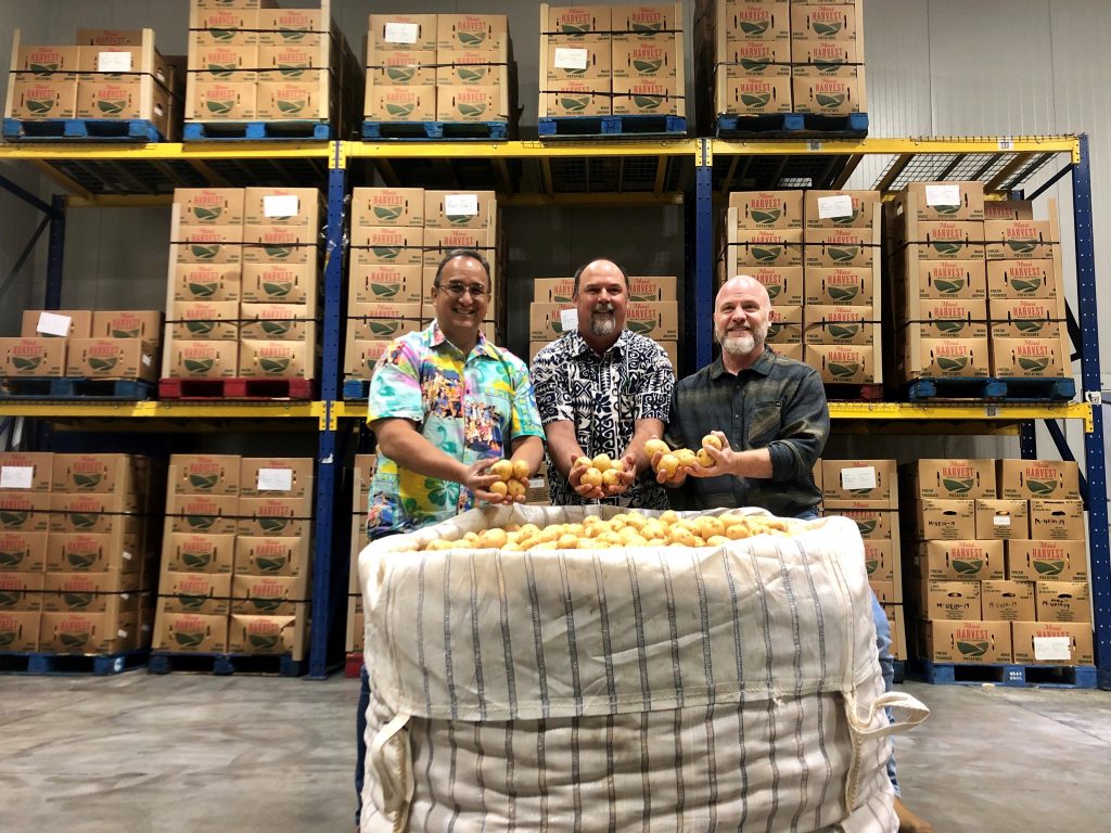 Ron Mizutani, president & CEO of Hawaii Foodbank; Darren Strand, VP of agricultural outreach and business development at Mahi Pono; and Chad Buck, owner & CEO of Hawaii Foodservice Alliance.