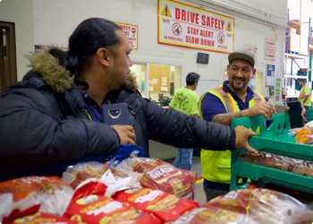 staff workers with bread